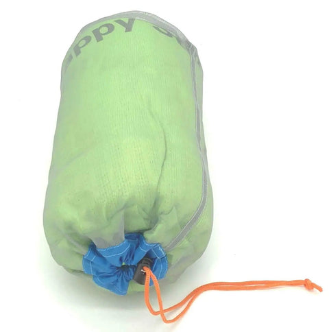 Light green nylon pouch from Mesh Stuff Sack Set Of 5 Ultralight Drawstring Gear Pouches For Backpacking, Camping, And Travel.