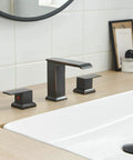 Oil Rubbed Bronze Widespread Bathroom Faucet With 8 Inch 3-Hole Mount 2-Handle Waterfall Vanity Lavatory Tap Modern Sink Fixture With Pop Up Drain And Overflow For RV Or Home installed on a light wood vanity.