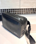 Floating Waterproof Fanny Pack Waist Pouch For Phone Wallet Keys Passport Cards Up To 1.5m Submersion in black with water droplets