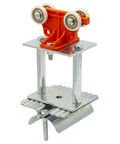 Prowinch heavy-duty flat cable festoon trolley with orange roller block mounted on metal mounting plate (front view).