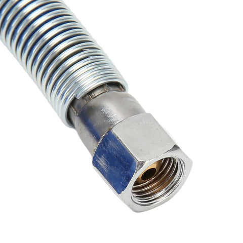 Close-up of metal connector on high temperature silicone steam hose blue for boilers and steam irons.