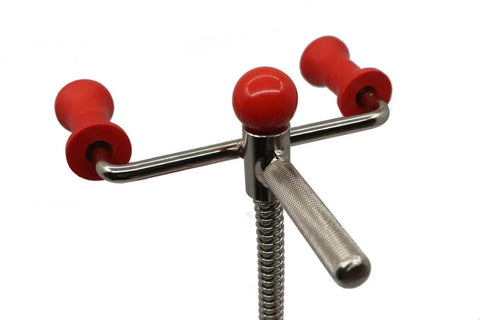 Close-up of 15 Inch Steering Wheel Holder Alignment Tool With Adjustable Height And Locking Switch, red handles visible