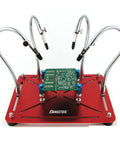Helping Hands Soldering Stand With Four Gooseneck Arms And PCB Holder on red non-slip base for electronics and hobby crafts