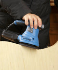 Beefy 4.9 Inch Random Orbital Sander Corded Power Tool With Full 20 Piece Sandpaper Roll Kit smoothing wood surface.