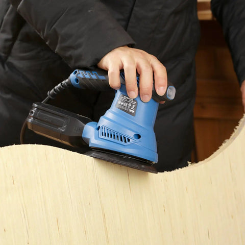 Beefy 4.9 Inch Random Orbital Sander Corded Power Tool With Full 20 Piece Sandpaper Roll Kit smoothing wood surface.