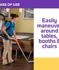 User easily maneuvers Heavy Duty Commercial Backpack Vacuum With Slick HEPA Media Filtration around restaurant tables.