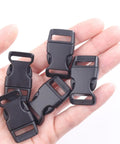 Durable Five Eighth Inch Curved Paracord Bracelet Clips Pack Of 30 Beefy Plastic Side Release Buckles in hand