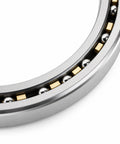 Precision Thin Section Roller Bearing 4.500 X 5.500 X 0.500 Inch for Robotics and CNC Rotary Tables, featuring silver steel and gold spacers.