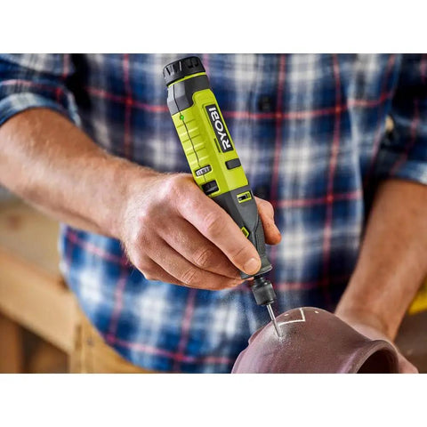 Heavy Lifting Cordless Lithium Rotary Tool Kit With Usb Charge Port And Fast Change Collet, Packs 15 Useful Attachments For Carving Sanding Etching And Crushing Weekend Diy Projects Like A Pro Without Breaking Sweat, shown in use for etching.