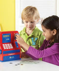Children using Kid Friendly Interactive Pretend ATM Bank For Kids Electronic Piggy Bank With Deposits And Withdrawals