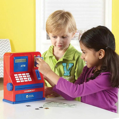 Children using Kid Friendly Interactive Pretend ATM Bank For Kids Electronic Piggy Bank With Deposits And Withdrawals
