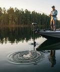 Fisherman using 3-Blade Trolling Motor Propeller Replacement For MGA089B High Thrust Low Draft Shallow Water Prop Kit on lake.