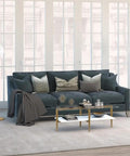 Living room with Globe And Stem Floor Lamp With Brass Finish And White Plastic Shade, cozy warm glow, alongside modern grey sofa.