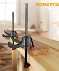 24 Inch Quick Release Bar Clamp With 30 Inch Spreader, Ratcheting Design, shown clamping wood in a workshop setting