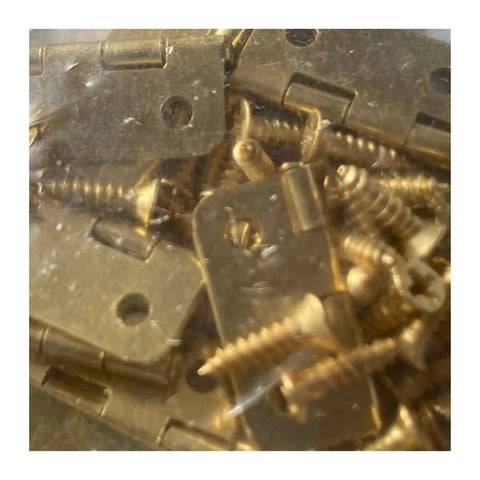 Close-up of 10 Pack Gold Door Hinges For Cabinets 4 Hole Heavy Duty Iron Hardware with screws for easy installation.