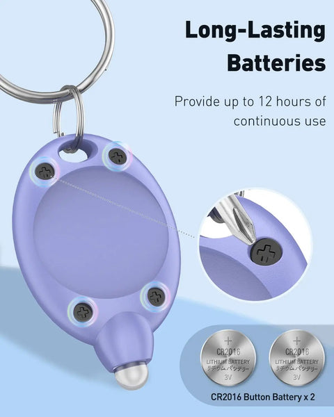 Close-up of a purple 5 Pack LED Keychain Flashlights, 12 Lumen Mini Pocket Lights For Outdoor Work Camping And Hiking with batteries