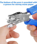 Person holding one hole paper punch with soft grip handle one quarter inch hole puncher for crafts and scrapbooks with mess tray