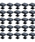 Top Shelf Solid 1 9/16 By 1 1/8 Inch Matte Black Cabinet Knobs With Hearthstone Finish displayed in a grid layout.
