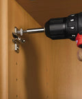 Installing Tough As Nails 410 Stainless Steel Self Tapping Screws Heavy Duty Phillips Head into wooden cabinet.