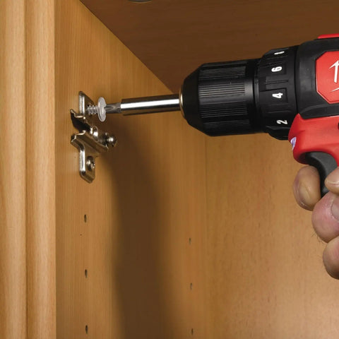 Installing Tough As Nails 410 Stainless Steel Self Tapping Screws Heavy Duty Phillips Head into wooden cabinet.