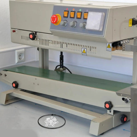 Premium Nichrome Heating Element For Heat Sealing Machines Silver Replacement Strip installed in a heat sealing machine.