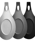 Three Piece Silicone Spoon Rest Set For Stove Top And Kitchen Counter in black, dark grey, and light grey, front view