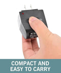 Built Tough AC To DC Car Converter Outlet 12 Volt 500mA Cigarette Lighter Socket Adapter held in hand, compact design, easy to carry.