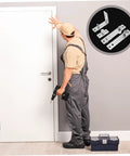 Installer with drill working on door using Heavy Duty Pivot Hinge Kit For Doors And Cabinets Concealed Hidden Hinge System For DIY Secret Door Projects Crossed Pivot Concealed Hinge With Hardware Included, hinge parts displayed.