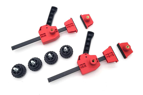 Hella Tight 12 Piece MFT Table Clamp Kit For Workbenches Featuring 4 Inch Vertical And Horizontal Clamps With 20mm Dog Holes Bench Dogs And Locking Knobs. Red and black clamps with knobs and spacers.