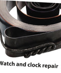 Close-up view of Vintage Mechanical Alarm Clock Repair Kit's durable steel parts with precision winding key for timepiece maintenance