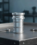 Heavy Duty Six Inch Female Cam Lock Coupling Machined From Rugged Aluminum Alloy With Quick Release Design on workbench.