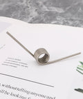 Beefy Torsion Springs Set For Fireplaces With Sliding Doors, 4 Pack, shown with 304 stainless steel build on paper surface