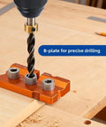 3 In 1 Aluminum Dowel Jig For Woodworking features a B-plate for precise drilling on wood, showcasing its sturdy orange body.