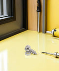 Precision Hand Operated Spring Loaded Locking Plunger Pin With M10 Thread And Knurled Stainless Steel Handle on yellow work surface.