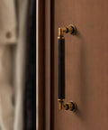 Antique Brass Cabinet Pulls 5 Pack 5 Inch Center Hole Knurled Retro Drawer Handles on a wooden cabinet.