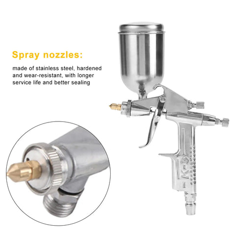 Compact Pneumatic Spray Gun With Tight 0.5mm Nozzle And 125ml Gravity Cup delivers detailed view of stainless steel nozzle and gravity cup.