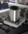Heavy Duty Square Flange Linear Ball Bearing, ID 12mm OD 21mm, SAE 52100 carbon steel, shown from the side.