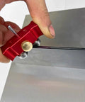 Close-up of Two by Seventy-Two Knife Maker's Edge Scribe and Center Line Scribe Set marking steel.