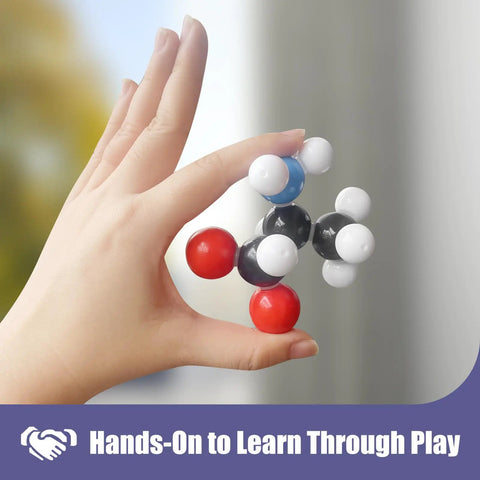Hand holding molecular model from Hands On Organic Chemistry Model Kit For Learning And Exploration, 444 Piece Molecular Kit