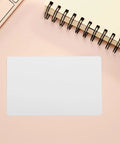 Twenty Piece Bundle Of Slick Blank White Pvc Id Cards With Heavy Duty Waterproof Coating And Hassle Free Printing For Quick Employee Badges And Double Sided Photo Cards In Sharp Resolution on a pink desk.
