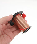 Hand holding copper coil from Hands On Electromagnetic Induction Solenoid Kit For High School Physics With Primary And Secondary Coils A Real Life Science Experiment Tool For Demonstrating Faradays Law And Electromagnetism Basics.