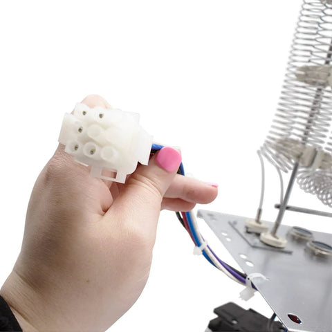 Hand holding connector for 10 kW Electric Heater Kit With Circuit Breaker For HVAC Air Handler, Plug and Play High Output Heating Upgrade
