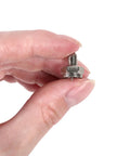 Hand holding a Five Pack Coax Terminator Cap 75 Ohm Coax Cable Cap Cover for Splitters TV Antennas Wall Plates and Booster Ports