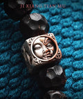 Premium Tibetan Style Spacer Beads For Bracelets And Necklaces Diy Jewelry Crafting Supplies showing a decorative silver face bead.