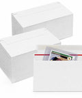 100 Pack Card Shipping Envelopes 7 By 4.35 Inches Self Adhesive Mailers For Trading Cards Fits Toploaders And Semi Rigid Holders Protective White Mailing Supplies with visible trading card inside.