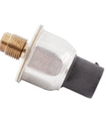 Brake fluid pressure sensor with brass threaded port, silver body, and black electrical connector (close-up view).
