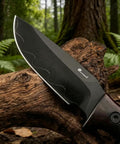 Fixed Blade Knife With Rosewood Handle And Leather Sheath For Outdoor Use VG10 Steel Blade resting on a tree trunk outdoors.