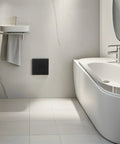 Slick Black Plastic Wall Access Panel Swings Open For Easy Inspections Fits Perfectly In Tight Spots near bathtub.