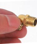 Hand holding a 90-degree brass nozzle from Grease Fitting Assortment Kit With Straight And Angled Nozzles For Automotive And Mechanical Use.