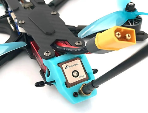 Close-up of GPS Compass Module With Upgraded 10th Gen Chip on FPV drone, showing multi GNSS antenna and wiring.